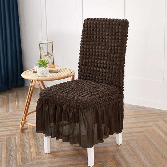 Brown bubble chair cover with textured fabric and stretchable design for a snug fit on standard chairs