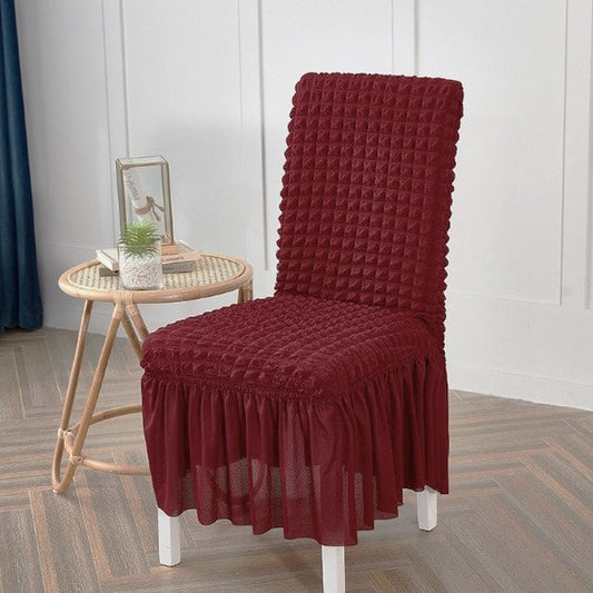 Maroon bubble chair cover with textured fabric and stretchable design for a snug fit on standard chairs