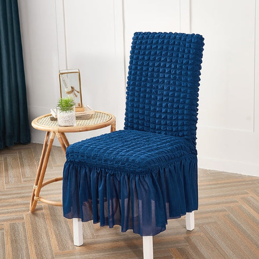 Navy bubble chair cover with textured fabric and stretchable design for a snug fit on standard chairs