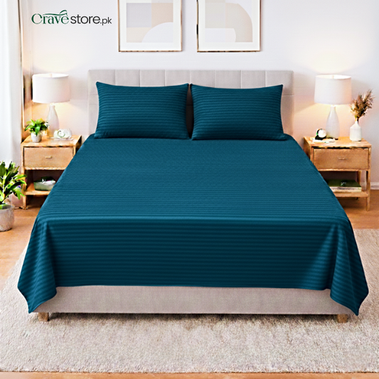Zinc striped king size flat bedsheet with two matching pillow covers on bed