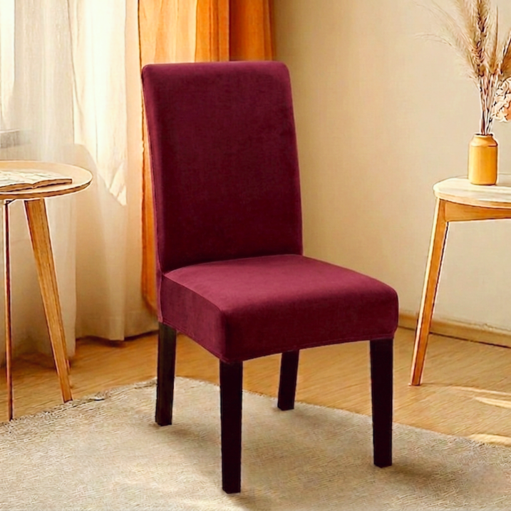 Maroon fitted jersey chair cover with stretchable fabric and elastic edges for a snug fit on standard chairs