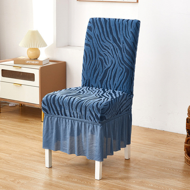 Navy blue zebra chair cover with textured fabric and stretchable design for a snug fit on standard chairs