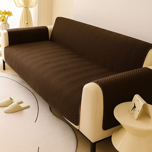 Brown zigzag ultrasonic quilted sofa cover on living room sofa